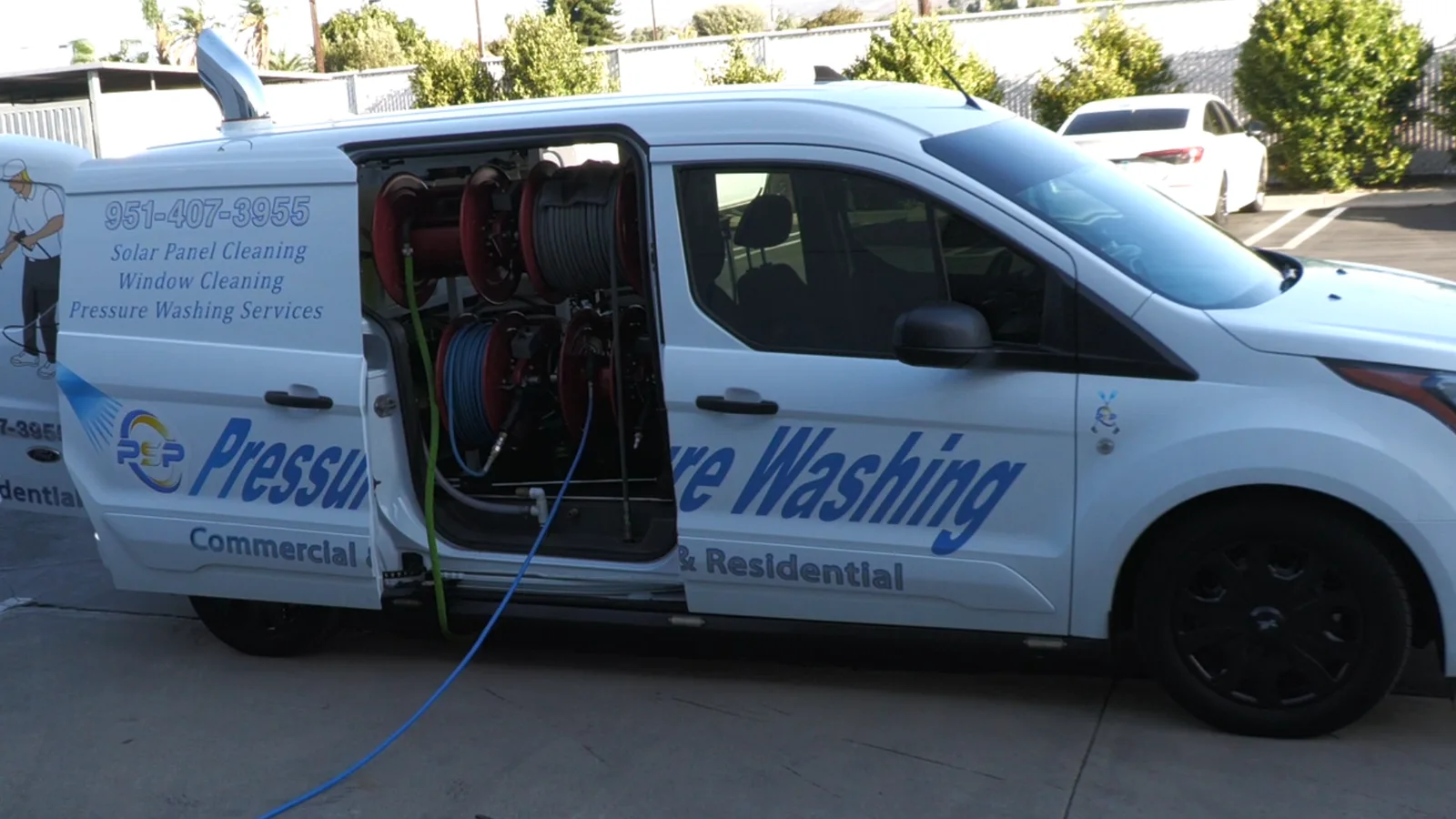 Hose reels and cleaning equipment inside the PSP van.