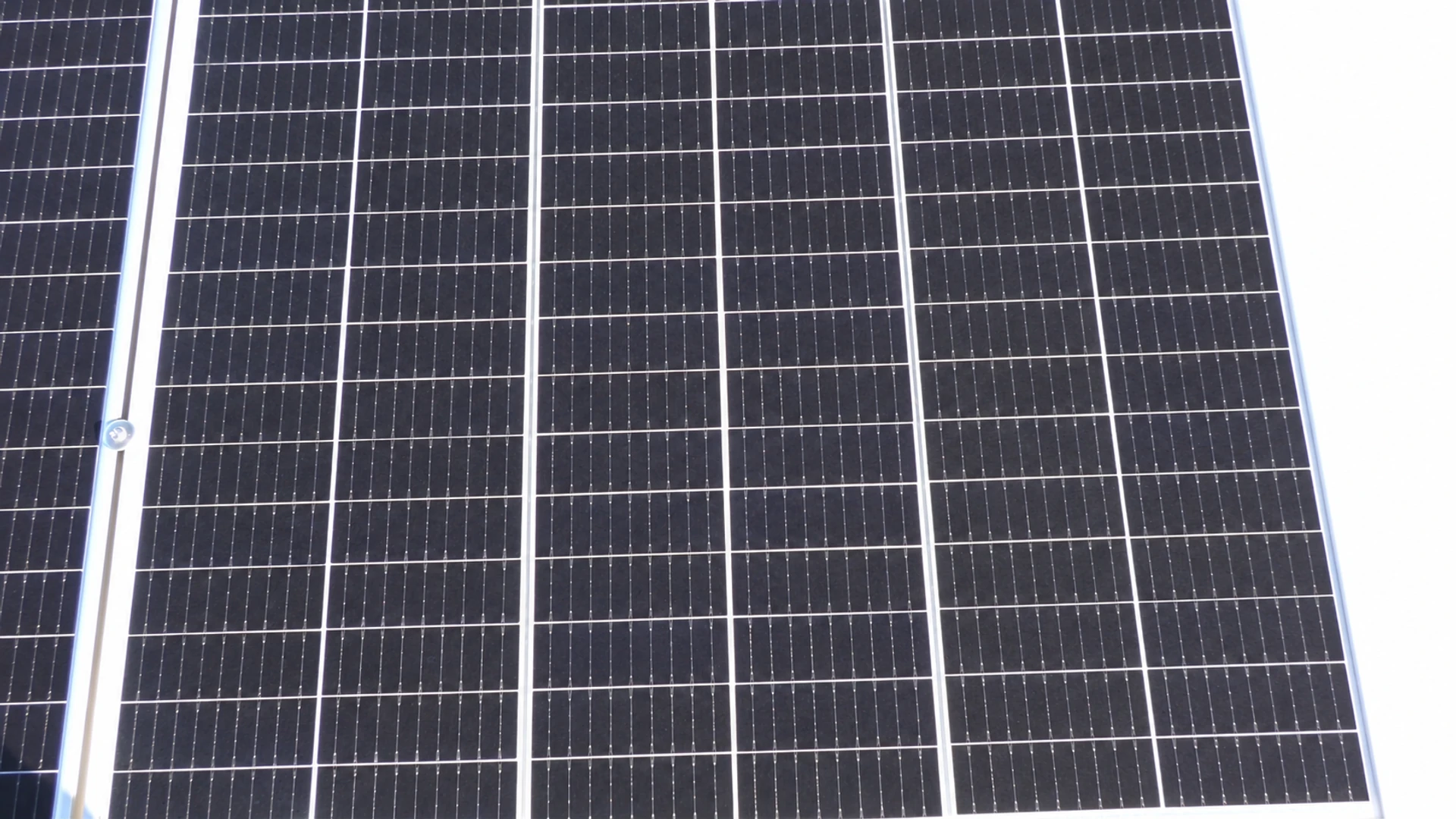 Illustrative solar-panel comparison with added dirt on the before view and a retouched clean view.